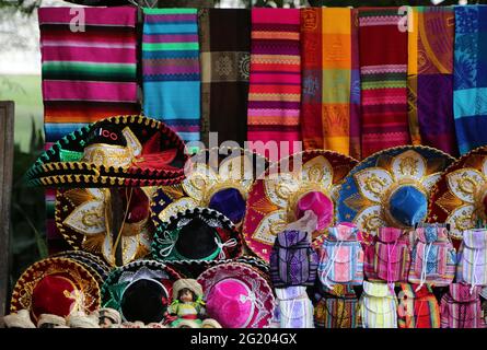Colorful stall full of Mexican souvenirs Stock Photo
