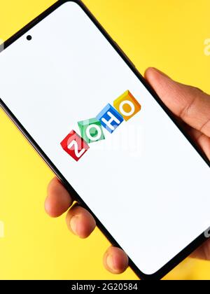 Assam, india - May 29, 2021 : Zoho logo on phone screen stock image. Stock Photo