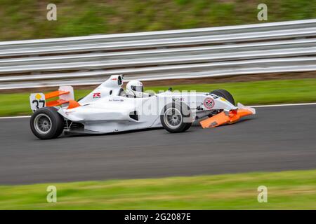 Single Seaters, Honda, Pick Up and Sports Car racing at Oulton Park Raceway Motorsports Track Cheshire Stock Photo