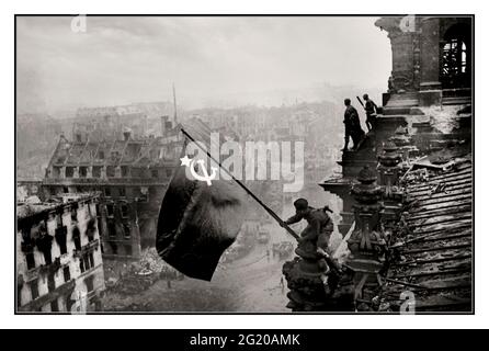 Raising flag over reichstag hi-res stock photography and