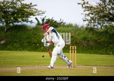 Farmers Cross, Cork, Ireland. 07th June, 2021. In their first match in a year and a half Harlequins 3 played Cork County 3 in a friendly warm up match before the season starts at Harlequin Park, Farmers Cross Cork. Picture shows Ritesh Sah defending his wicket. - Credit; David Creedon / Alamy Live News Stock Photo