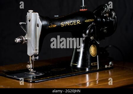 Vintage sewing machine Singer 15-91. Retro seamstress tools Singer Sewing Machine. Stock Photo