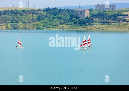 Tbilisi sea and boats with sails, nature Stock Photo