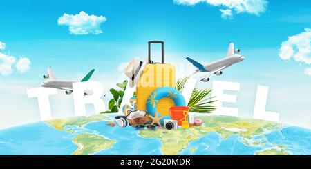 Travel composition with bag, hat, beach items and planes on world map. Creative summer travel concept Stock Photo