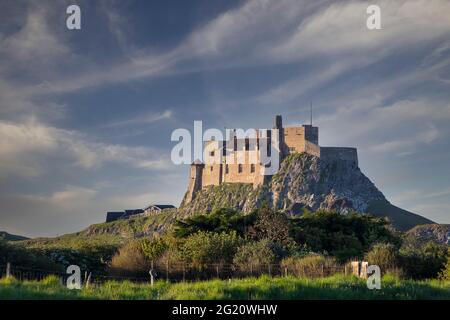 The castle on the Holy Island of Lindisfarne in Northumberland, UK Stock Photo
