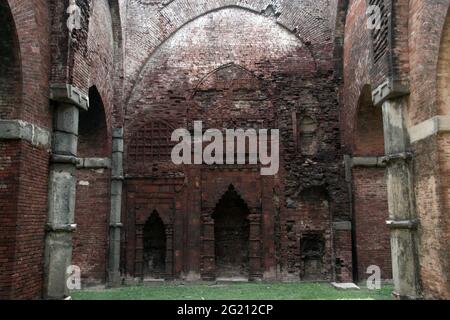 The remaining of Darasbari Mosque, the largest mosque in Bangladesh now in ruins. Located in Shibganj in Chapai Nawabganj, the mosque was built in 1479 AD by Shamsuddin Abul Muzaffar Yusuf Shah Shibganj. Bangladesh. May 30, 2009. (Source: www. Banglapedia.com) Stock Photo