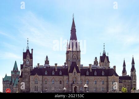 Ottawa, Canada - May 23, 2021: Parliament building in the capital of Canada, Ottawa against blue sky. Parliament hill. West block Stock Photo