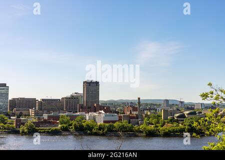 Canada, Ottawa - May 23, 2021: Panoramic view of Ottawa River and Gatineau city of Quebec in Canada from the hill on a sunny summer day