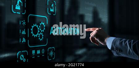 Man clicks on 3d virtual screen Automation. Optimization of business and production processes. Stock Photo