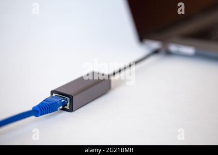 ethernet - type c adapter for laptop on white background Stock Photo