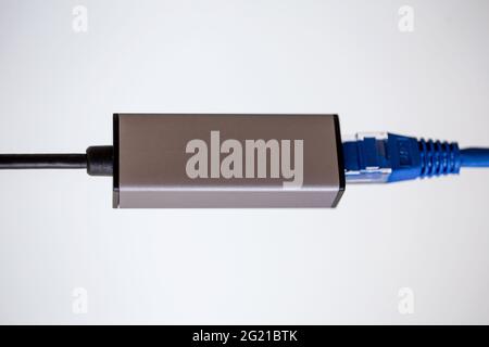 ethernet - type c adapter for laptop on white background Stock Photo
