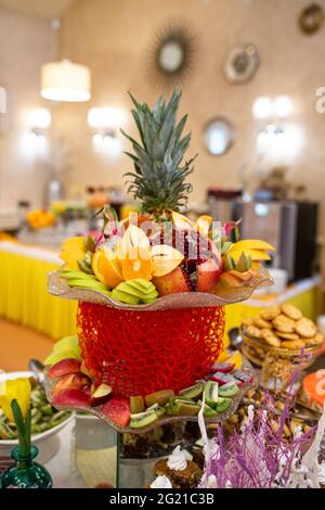 fruit basket on the table in the restaurant establishment. Stock Photo