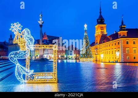 Warsaw, Poland - Illuminated Castle Square with Christmas Tree in Polish capital city. Stock Photo