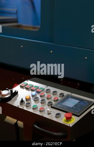 Control panel with touch screen of metalworking machine. Selective focus. Stock Photo