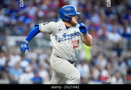 Los Angeles Dodgers infielder Max Muncy, wife Kellie Muncy and daughter  Sophie Muncy assemble Baby2Baby basic essential kits, which include hygiene  items, soap, and PPE supplies, as part of the Dodgers Foundation