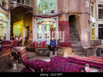 The Carpet ( Rug ) Bazaar of Tabriz. It is one of the oldest bazaars in the Middle East and the largest covered bazaar in the world. Stock Photo