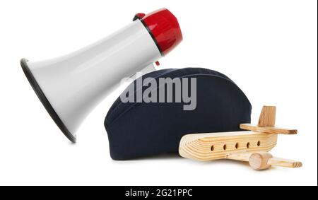 Stewardess hat with megaphone and plane on white background Stock Photo