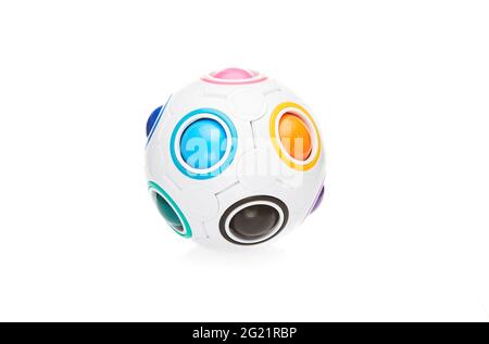 Ball shaped puzzle toy with colored balls isolated on white background Stock Photo