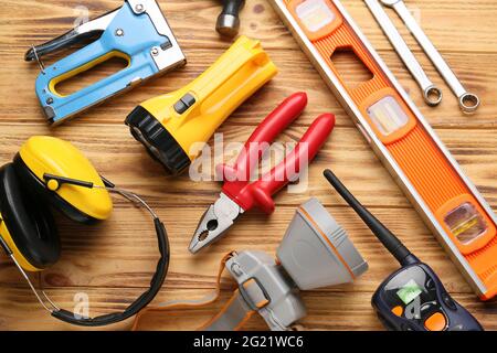Safety equipment on wooden background Stock Photo