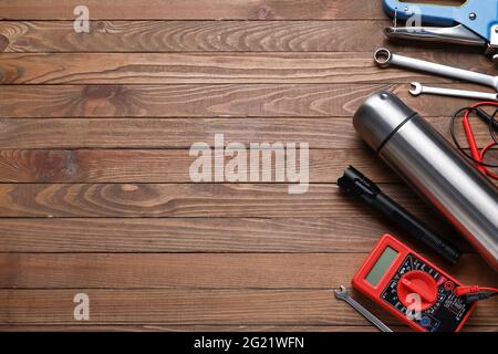 Safety equipment on wooden background Stock Photo