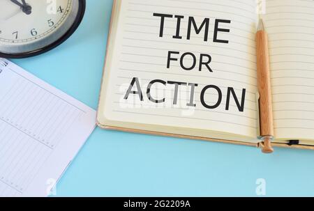 Time for action message writen in Notebook. Business photo showcasing getting ready to start doing encouragement Go fast Stock Photo
