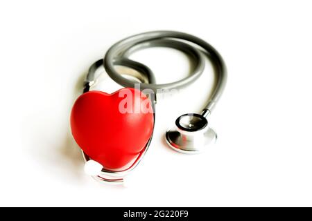 Stethoscope with heart isolated on white background Stock Photo