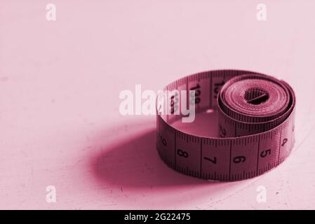 tape measure red sepia close up Stock Photo