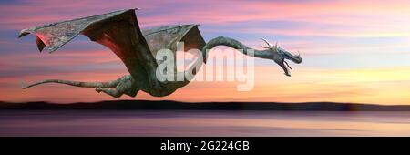 dragon, fast flying magical creature during sunrise Stock Photo