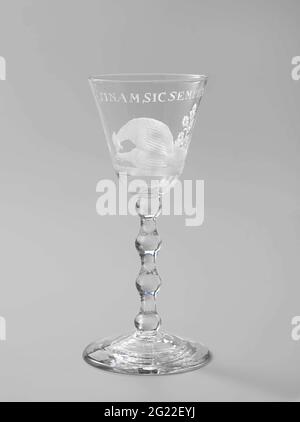 Wine glass with a cockerel mating with a chicken. translation of inscription: May it always be so Stock Photo