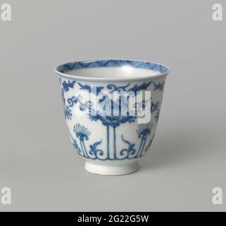 Bell-Shaped Cup with Lotus Scrolls. Bell-shaped head of porcelain, painted in underglaze blue. A continuous lotus drink on the outside wall. The bottom with a stylized branch in a double circle. On the inner edge a tire with arrearing. Blue White. Stock Photo