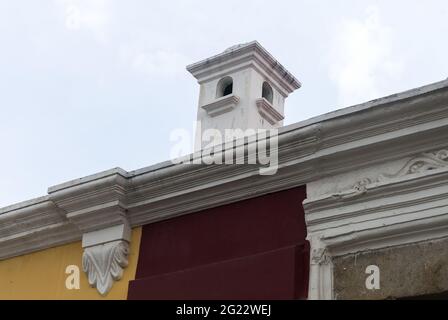 Architectural detail of chimneys in colonial houses of the colonial city of La Antigua Guatemala Stock Photo
