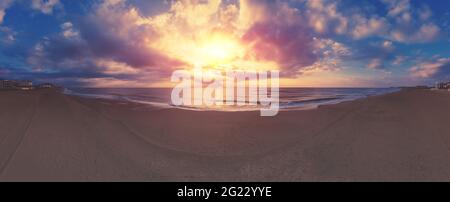 Seascape in the early morning. Sunrise over the sea. Nature landscape with dramatic sky. Horizontal panorama Stock Photo