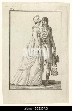 Tableau Général du Goût, AN 7, No. 13 (Dec. 21 1798): couple amoureux à la promenade. Amoureus couple walking on the promenade. The woman is wearing a key with long sleeves and trail, deposited with loops pattern. Accessories: Hat with feather, earring in the right ear, impeller, scarf. The man wears a jacket with scarf collar, cardigan and knee pants. His hat and the woman's reticule, with the initials l and g, in hand. Boots with pointed noses. The print is part of a series of 20 fashion prints issued by Gide, Paris, AN VII, 1797- 1799. Stock Photo