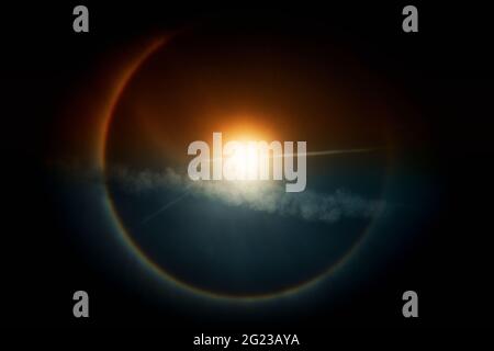 A circular Halo around the Sun , Natural light phenomena around the Sun. Stock Photo