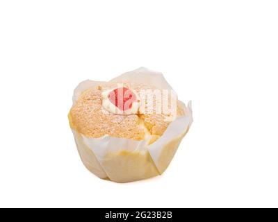 Soft cake cream, a close up of homemade delicious creamy cup cake with strawberry topping isolated on white background. Stock Photo
