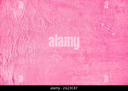 Concrete pink wall background on the street. Close up. Stock Photo