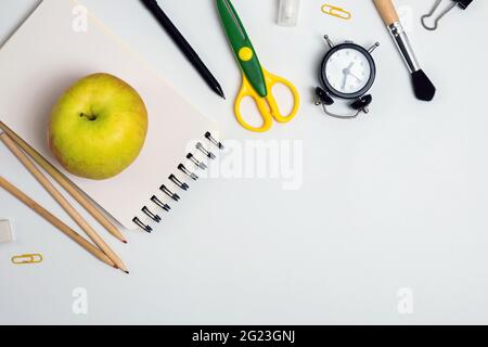 Back to school composition with different stationery on the white background Stock Photo