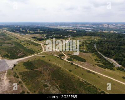 Runway and control tower at Greenham Common overlooking Newbury Racecourse and town in distance Stock Photo