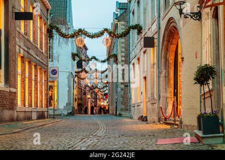 Shopping street with christmas lights in the city center of Maastricht, The Netherlands Stock Photo