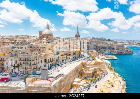 Aerial view of Lady of Mount Carmel church, St.Paul's Cathedral in Valletta embankment city center, Malta Stock Photo