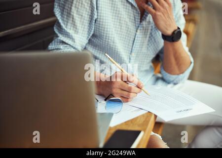 Focused photo on freelancer being on online meeting Stock Photo