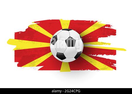 Realistic soccer ball on flag of Macedonia made of brush strokes. Vector football design element Stock Vector