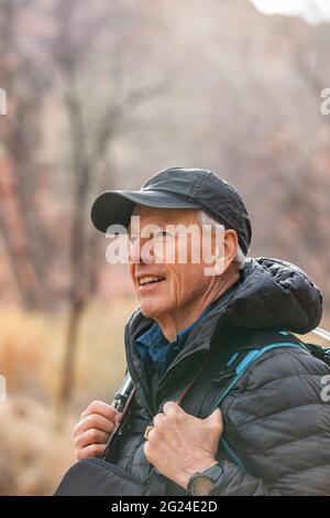 USA, Utah, Escalante, Senior man hiking in Grand Staircase-Escalante National Monument Stock Photo