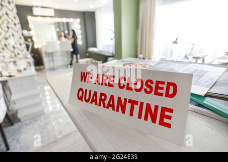 Quarantine in a beauty salon or hair salon. Problems of small business. sign with the warning we are closed quarantined during the outbreak of the cov Stock Photo