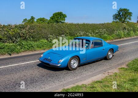 1968 60s Blue Lotus Elan +2, 1558cc blue fastback, en-route to Capesthorne Hall classic car show, Cheshire, UK Stock Photo