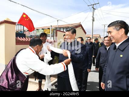 Gangcha, China's Qinghai Province. 8th June, 2021. Chinese President Xi Jinping, also general secretary of the Communist Party of China Central Committee and chairman of the Central Military Commission, learns about the lives of local Tibetan residents while visiting a village of Shaliuhe Township in Gangcha County of Haibei Tibetan Autonomous Prefecture, northwest China's Qinghai Province, June 8, 2021. Xi on Tuesday visited Gangcha County during his inspection tour of Qinghai Province. Credit: Xie Huanchi/Xinhua/Alamy Live News Stock Photo