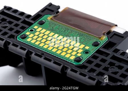 Contacts on the printed circuit board from the head of a color inkjet printer. Stock Photo