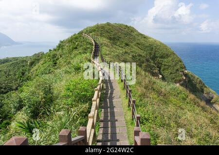 A pathway to lighthouse at Bitou Cape in Ruifang District, New Taipei, Taiwan Stock Photo