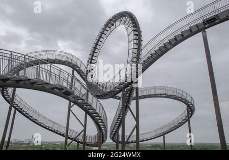 Duisburg September 2021: Tiger and Turtle - Magic Mountain is a landmark modeled on a roller coaster on Heinrich-Hildebrand-Höhe in Angerpark in Duisb Stock Photo