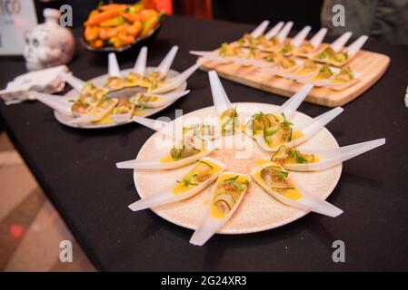 Japanese spoon appetizers with cucumber and garnish Stock Photo